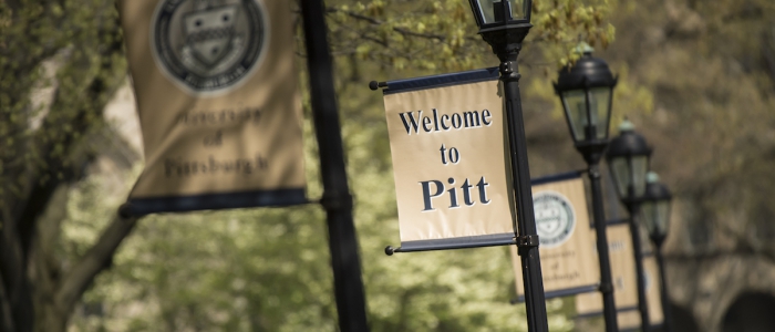 Welcome to Pitt banners hang throughout campus